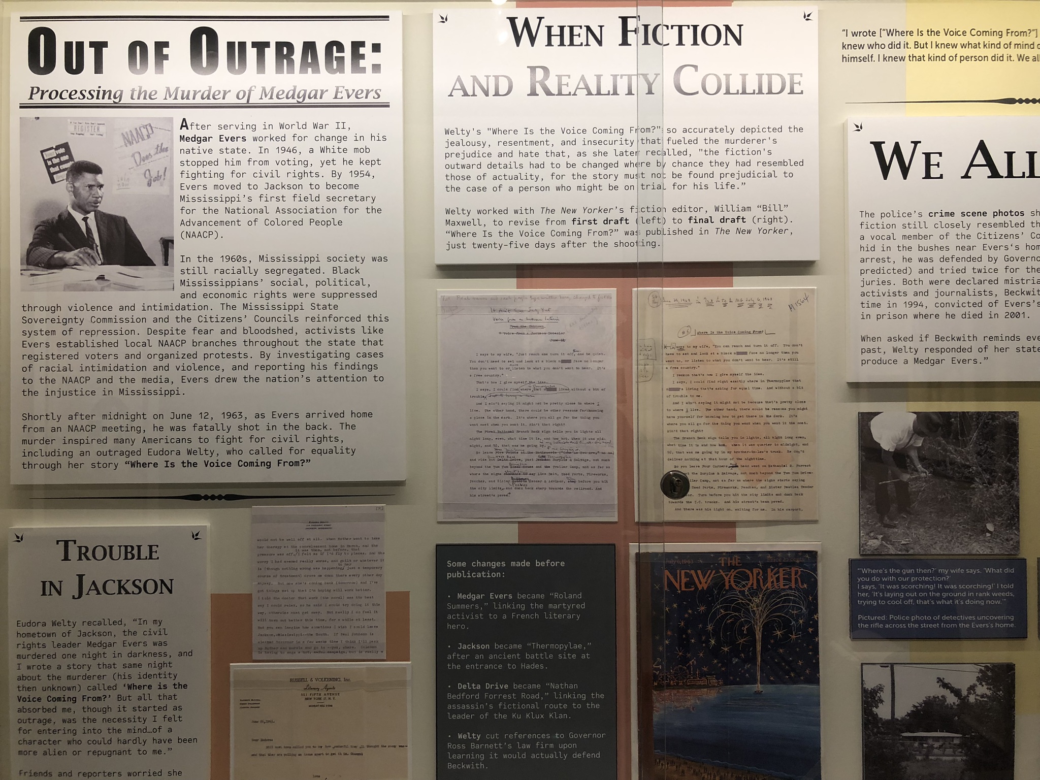 Photograph of Medgar Evers exhibit at Eudora Welty House & Garden featuring text panels and early drafts of Welty's short story Where Is the Voice Coming From?