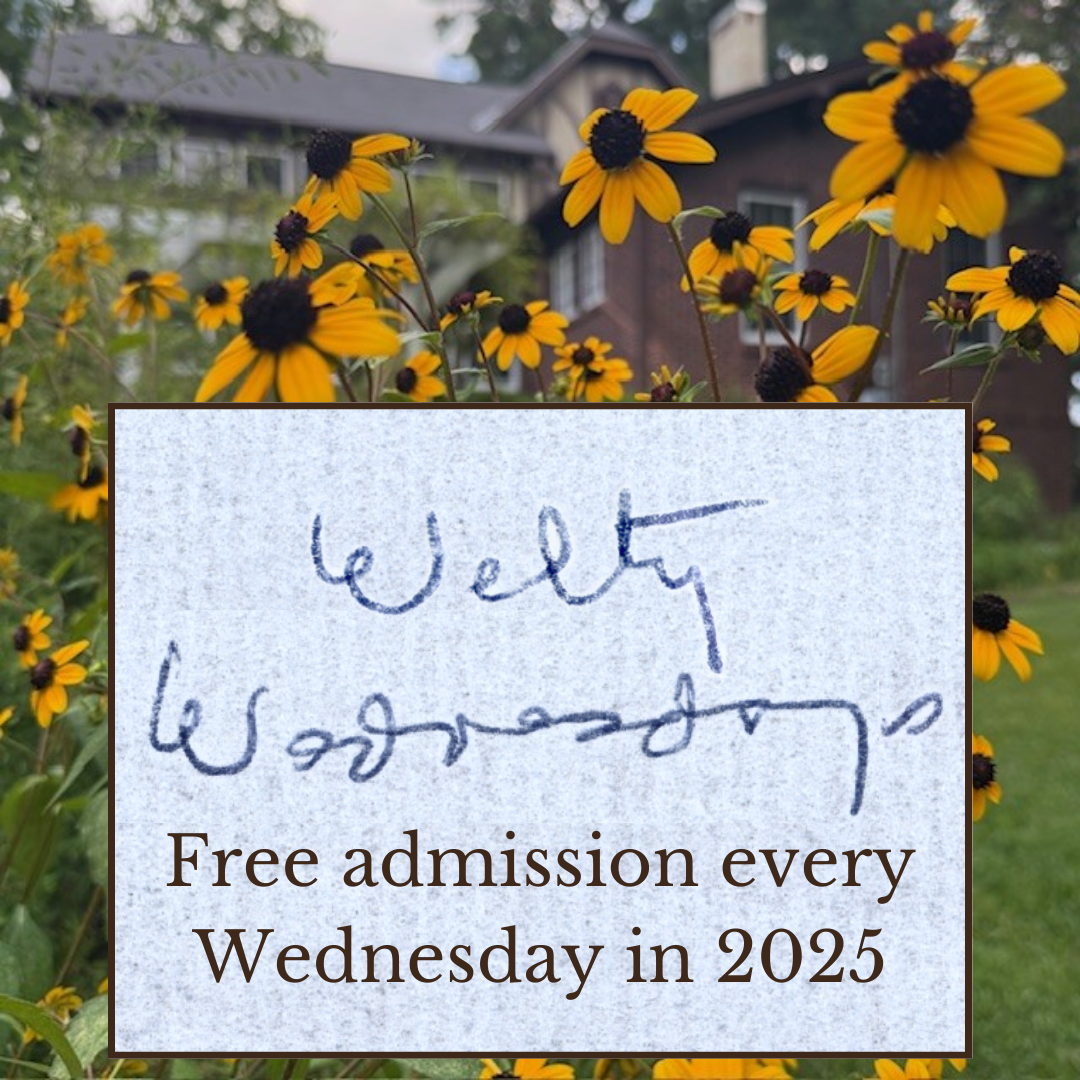 Black-eyed Susans bloom in the Welty Garden, with the Eudora Welty House visible in the background. An overlay features “Welty Wednesdays” in Eudora Welty’s handwriting and the text: “Free admission every Wednesday in 2025.”